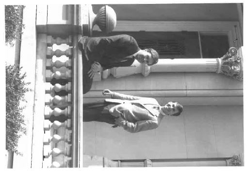 pat_and_tim_in_front_of_old_lou_building.JPG